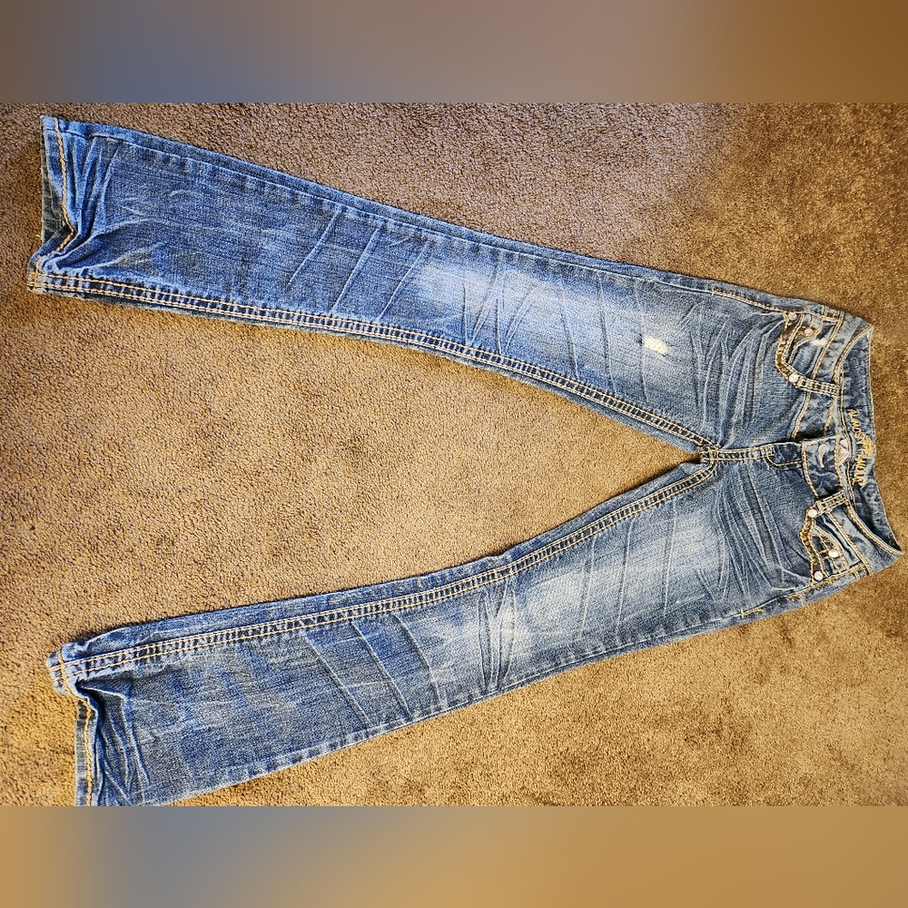 Almost famous size zero faded jeans.